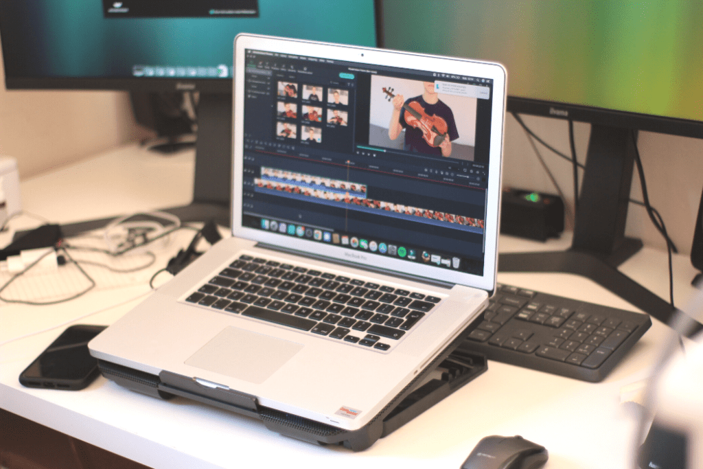 A laptop open with video editing software on it